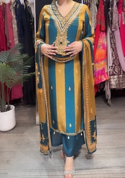 IMG-20260924-WA0511 Teal & Mustard Embroidered Crepe Suit Set